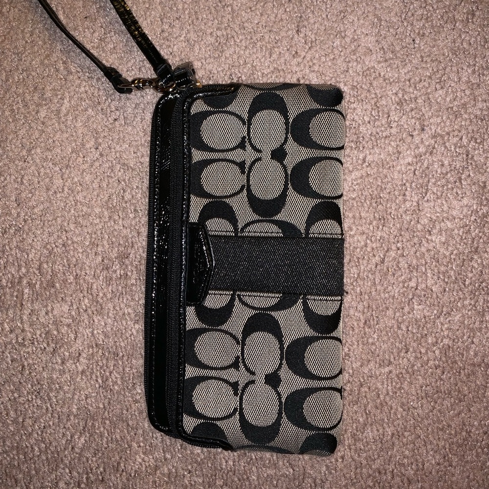Like new, black and grey coach wristlet!